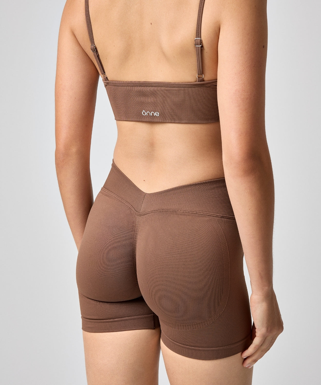 Aeris Short in Brown, back view, ÔNNE activewear